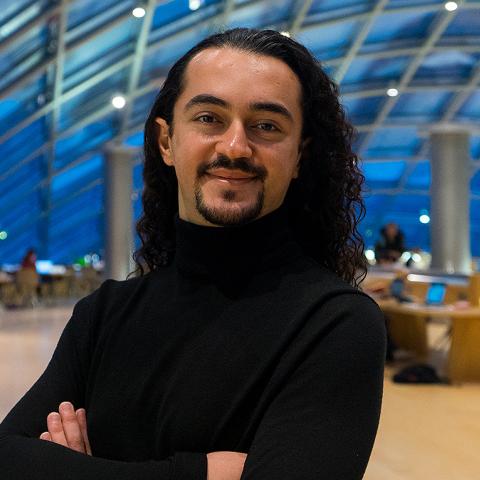 Ozan Beran Akturan standing in Mansueto glass dome