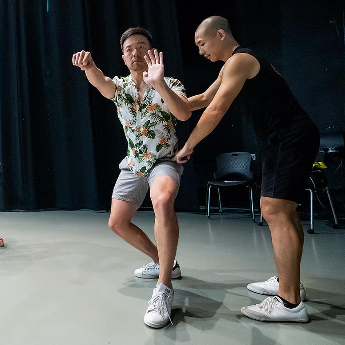 Kung fu master Oscar Lam with students